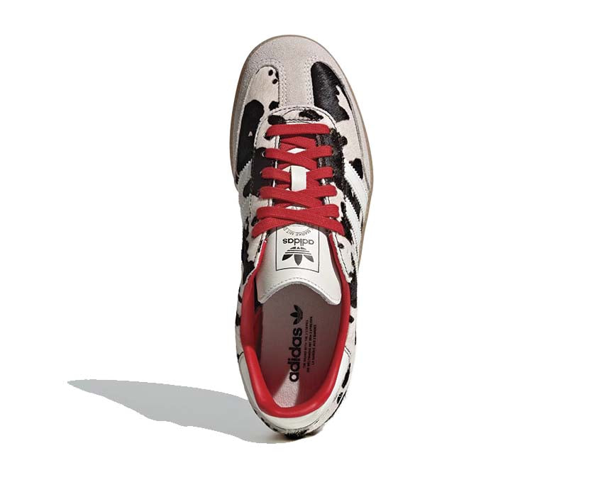 Scarpe da ginnastica basse in pelle con motivo mucca per donna