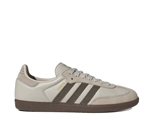 Scarpe da ginnastica classiche in pelle e gomma color alluminio.