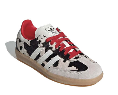 Scarpe da ginnastica basse in pelle con motivo mucca per donna