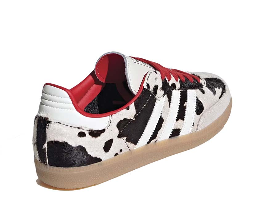 Scarpe da ginnastica basse in pelle con motivo mucca per donna