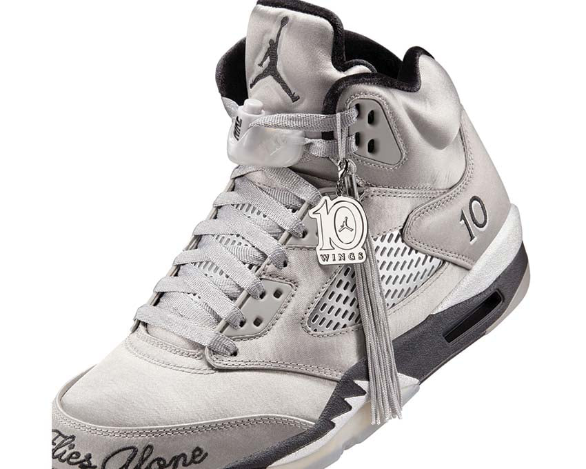 Scarpe da ginnastica retrò da donna con ali, modello numero 5.