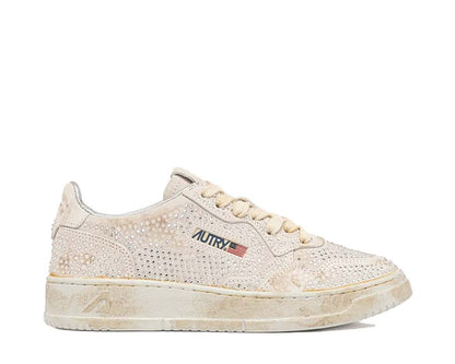 Scarpe da ginnastica basse da donna in pelle con dettagli trasparenti.