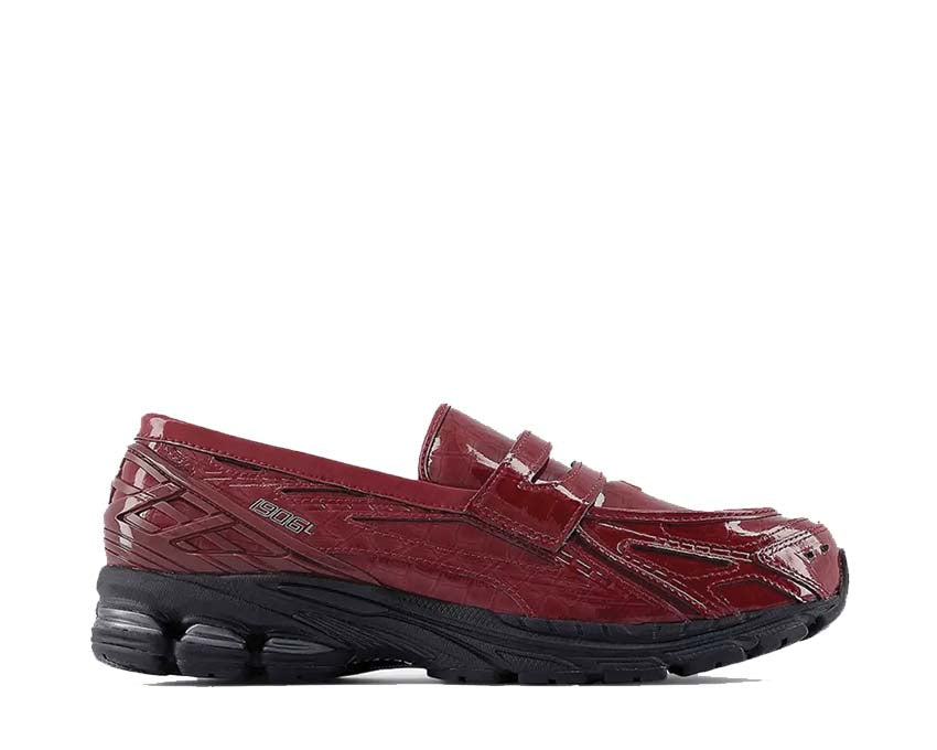 Scarpe da ginnastica rosse con motivo a coccodrillo