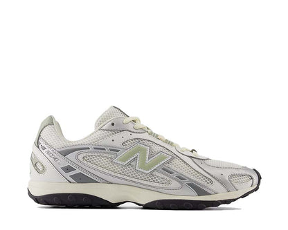 Scarpe da ginnastica in pelle e tessuto con design ispirato al serpente.