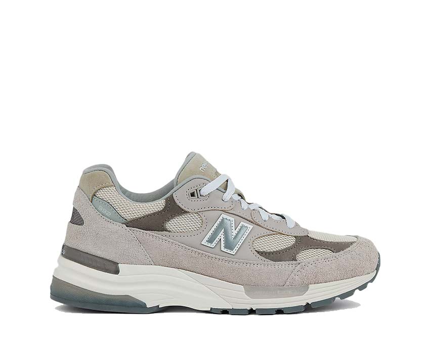 Scarpe da ginnastica in pelle e tessuto, prodotte negli Stati Uniti, colore grigio chiaro.
