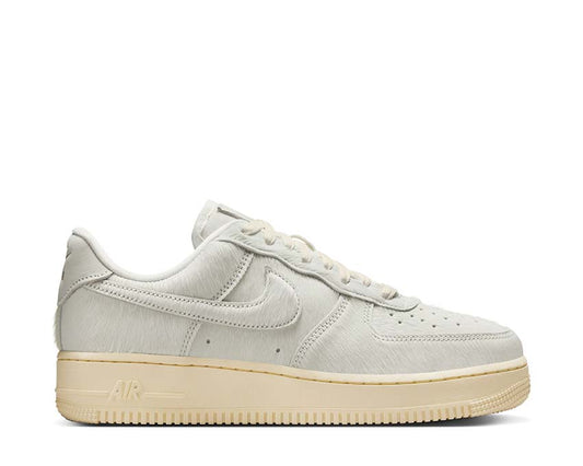 Scarpe da ginnastica in pelle con dettagli in pelo sintetico color avorio per donna