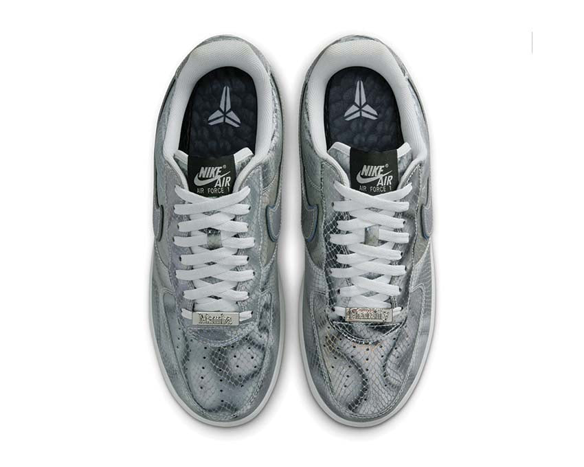 Scarpe basse in pelle con effetto lenticolare e design sportivo.