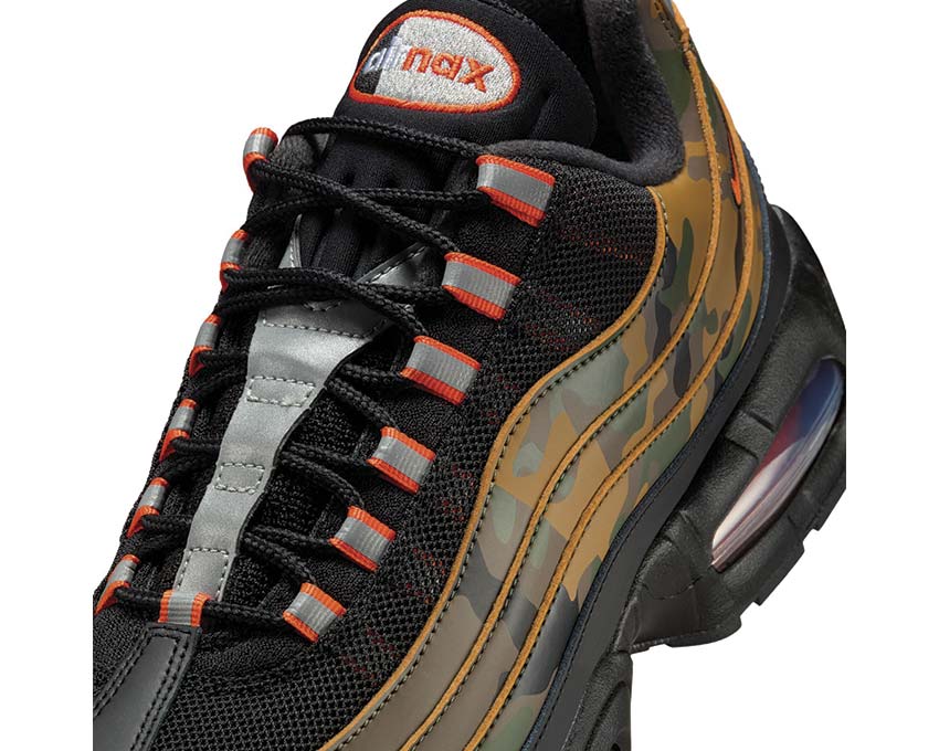 Scarpe da ginnastica unisex con ammortizzazione ad aria, colore arancione brillante.