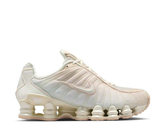 Scarpe sportive da donna con ammortizzazione, colore bianco perla.