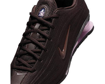 Scarpe da ginnastica con ammortizzazione a molle, colore marrone vellutato.