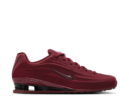 Scarpe sportive con ammortizzazione a molle, colore rosso scuro