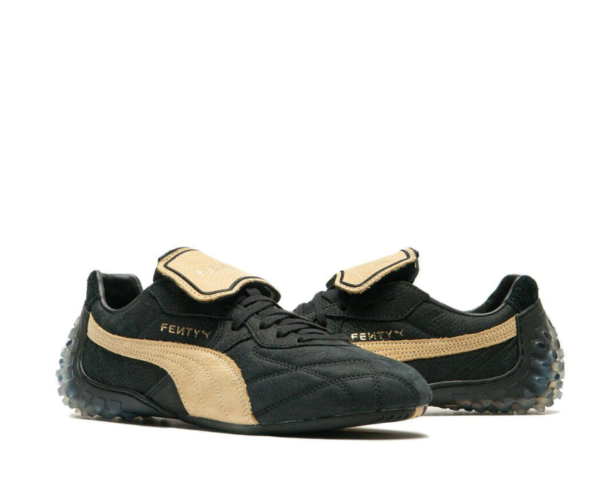 Scarpa sportiva in pelle nera e marrone chiaro con design elegante