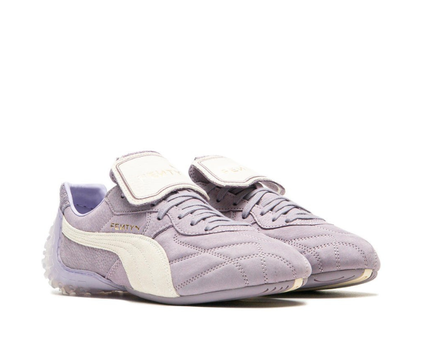 Scarpa sportiva in pelle color prugna chiaro con design moderno