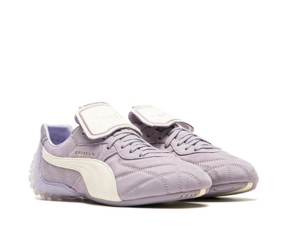 Scarpa sportiva in pelle color prugna chiaro con design moderno