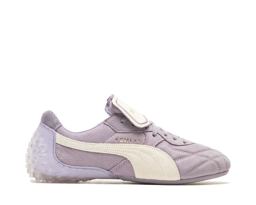 Scarpa sportiva in pelle color prugna chiaro con design moderno