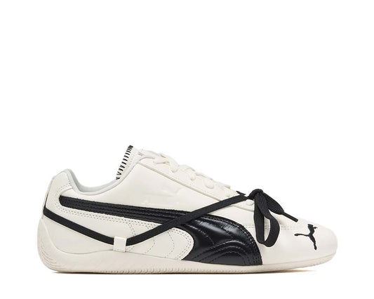 Scarpe sportive in pelle bianca con design elegante e dettagli raffinati.