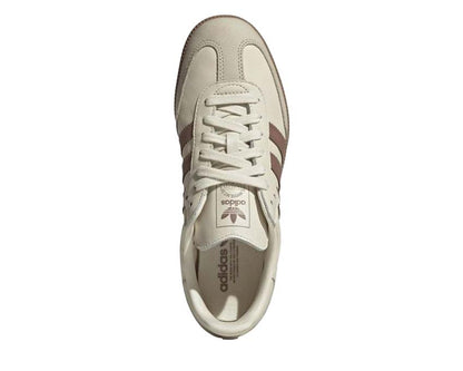Scarpe da ginnastica in pelle color argilla calda per donna, stile classico.